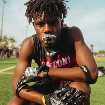 Man using battle football mouthguard