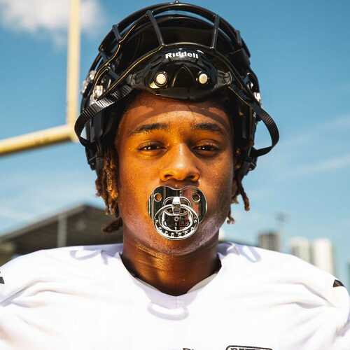 Football player wearing a mouthpiece