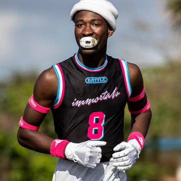 football player wearing bicep bands from Battle