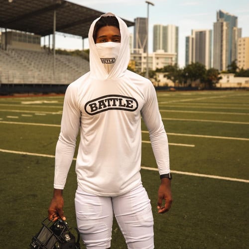 football player wearing a hoodie ready to play